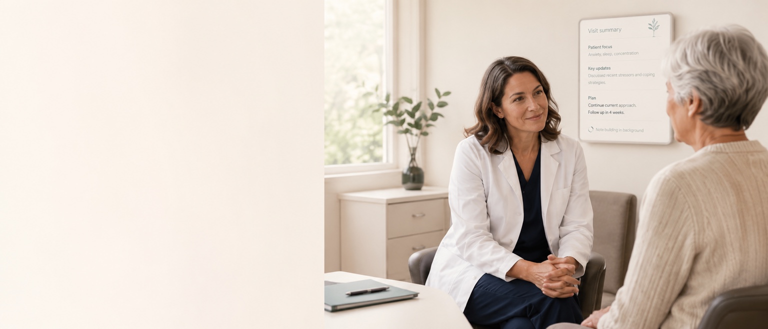 A clinician listening attentively to a patient during an in-person visit.
